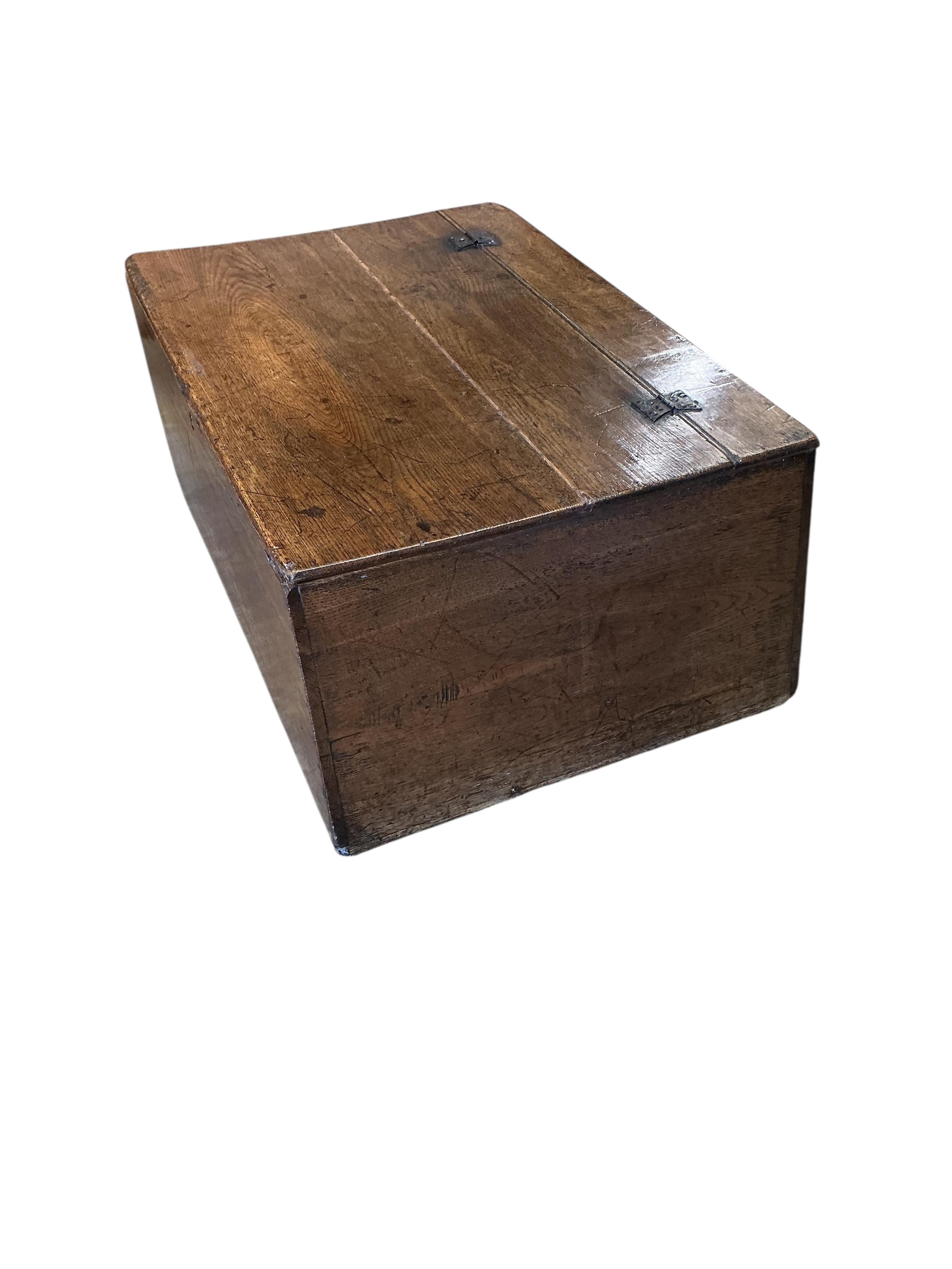 An unusually shaped 18th century oak box, width 72cm, depth 52cm, height 30cm